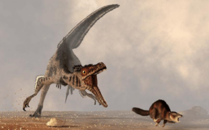 illustration-of-a-velociraptor-left-chasing-a-small-brown-mammal-right-m.png