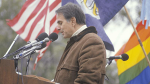 Carl Sagan speaking on stage.