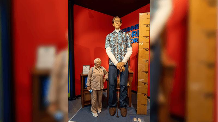 photograph-of-a-statue-of-tallest-man-in-the-world-robert-wadlow-a-person-standing-on-the-left-hand-side-m.png