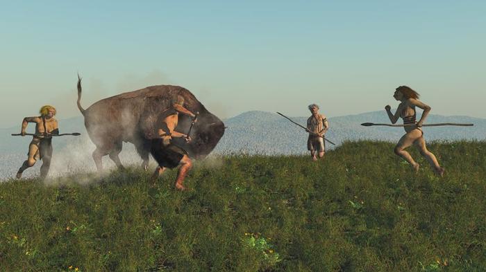 Illustrazione digitale di un gruppo di neanderthals che cacciano un bisonte.