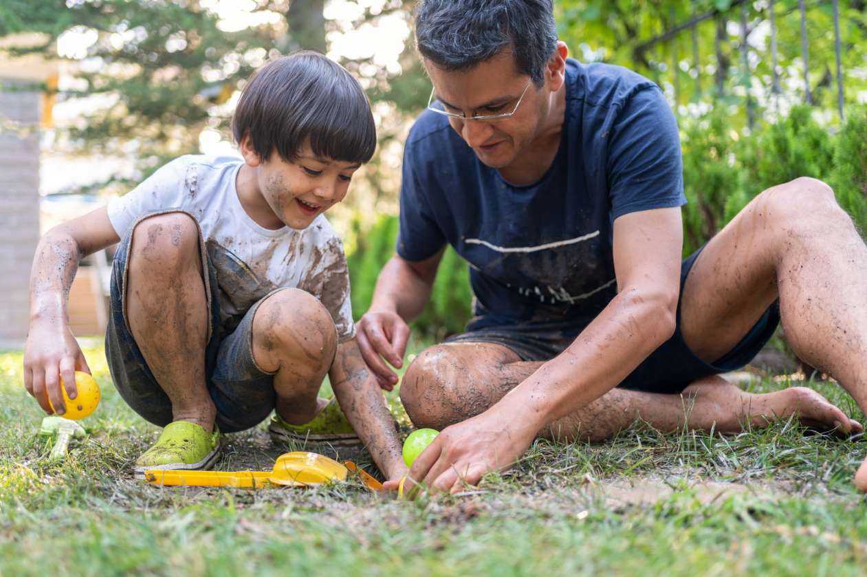 father-son-play-mud.jpg