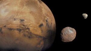 Immagine di Marte con le sue lune, Phobos e Deimos