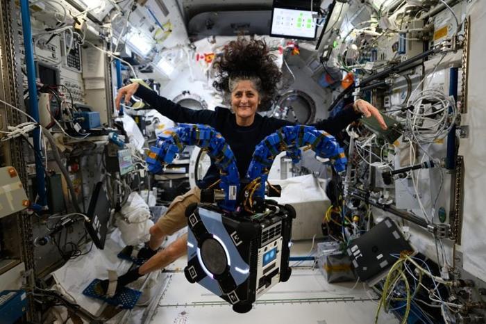 Astronaut Suni Williams Checks Out the Astrobee Robotic Free-Flyer