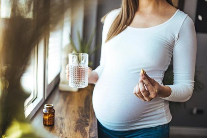 Donna incinta Vitamine prenatali Vicino