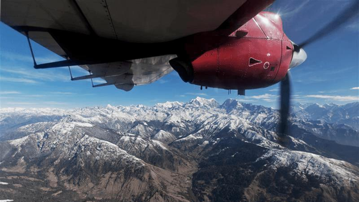 Un aereo che vola vicino all'Himalaya.